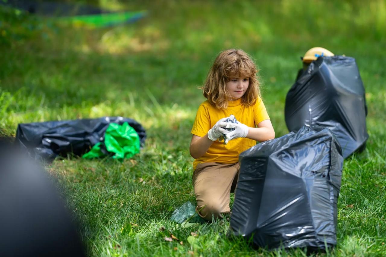 Child picking up litter