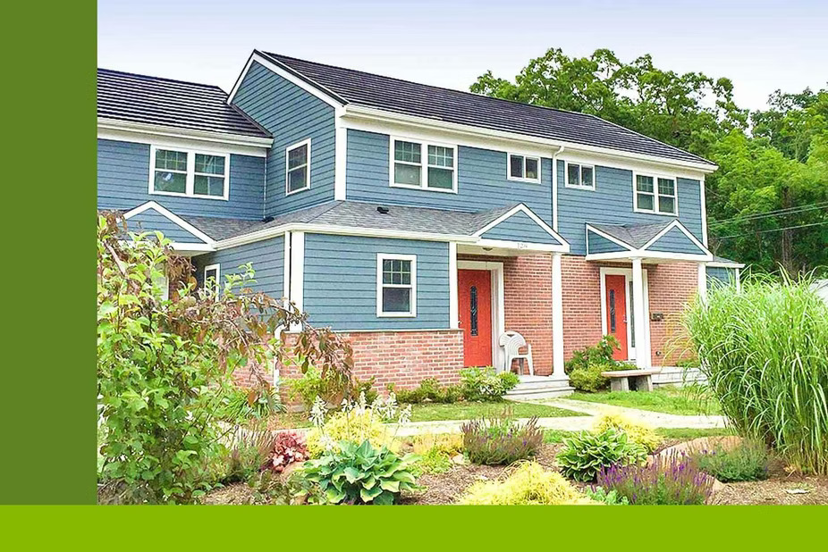 exterior of townhouse with landscaping in front