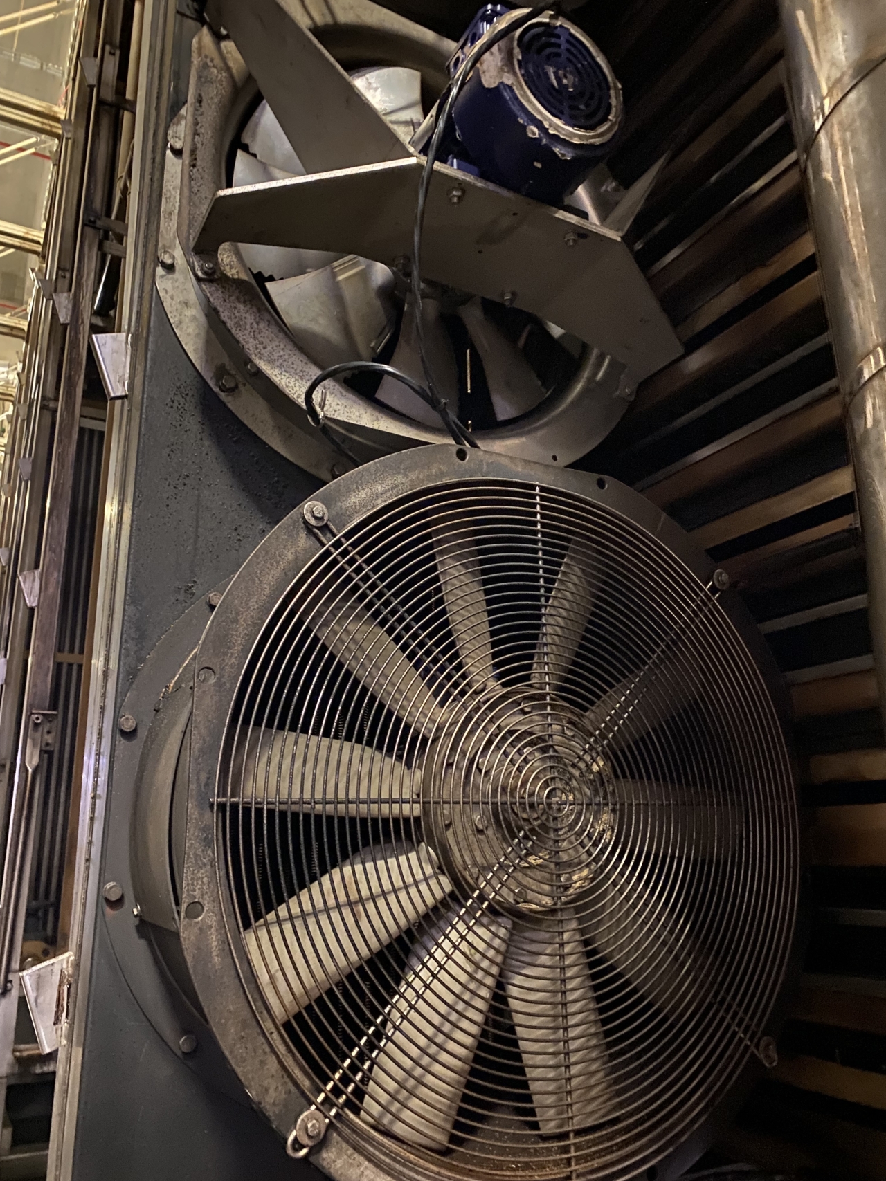 New energy efficient fans pictured at top; older version which is being replaced at bottom