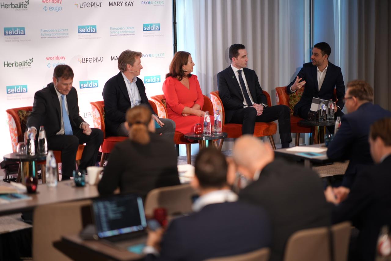 Ewa Kudlinska-Pyrz and others speaking on stage