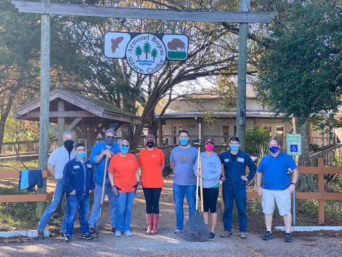 From left to right: Michael Plunkett, Javier Manzano, Carl Spaniel, Lisa Boozer, Amy Hues, Donald Savage, Ariana Cornwell, Corey Decker, and Clint Nicholson.​