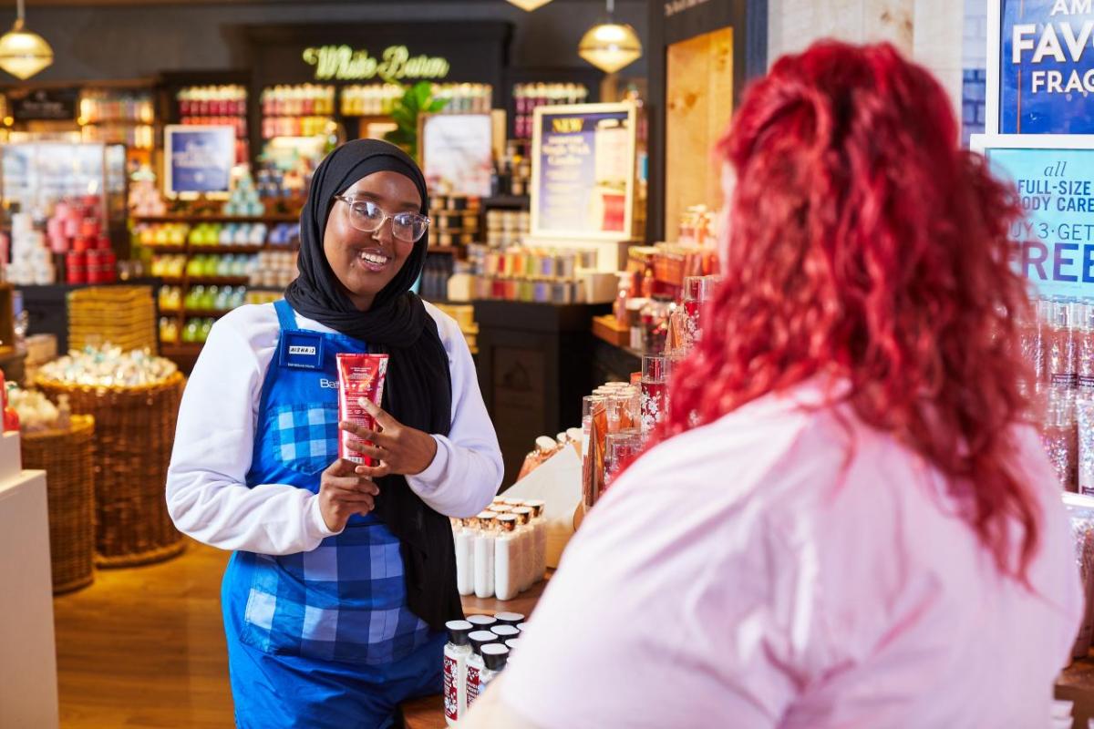 people talking at a Bath and Body Works store