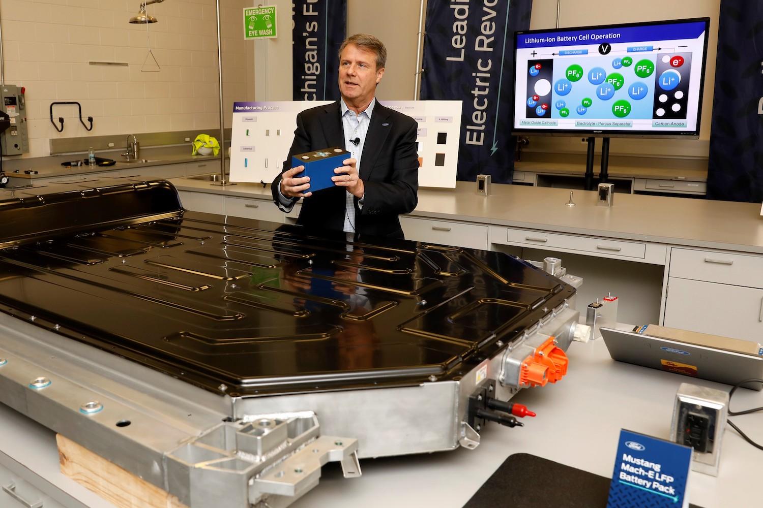 Ford scientist with EV battery - lithium iron phosphate batteries - sustainability solutions
