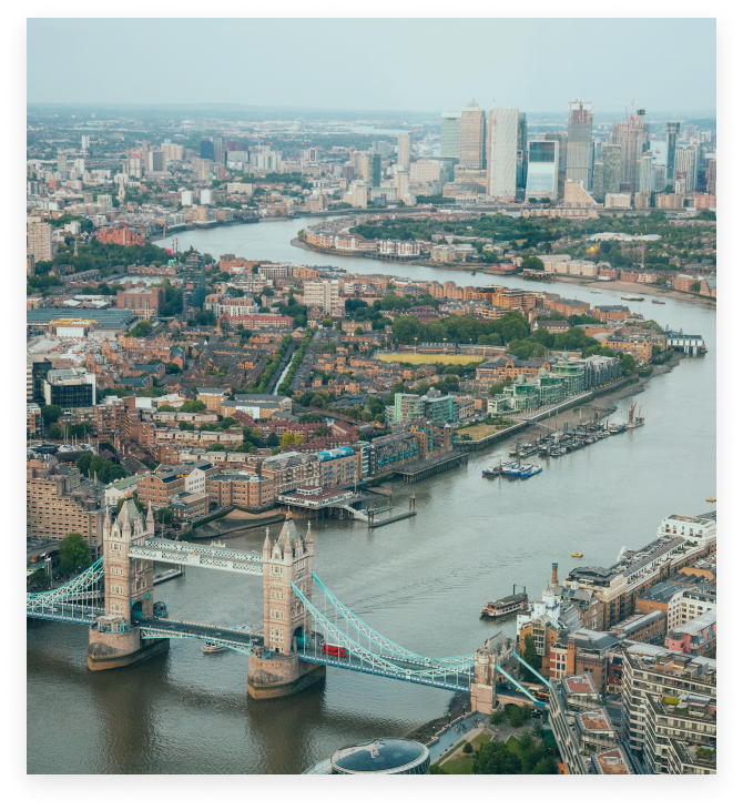 Overhead photo of London, the Thames River and London Bridge.