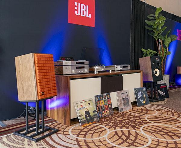 JBL turntable, speakers and receivers shown with records.