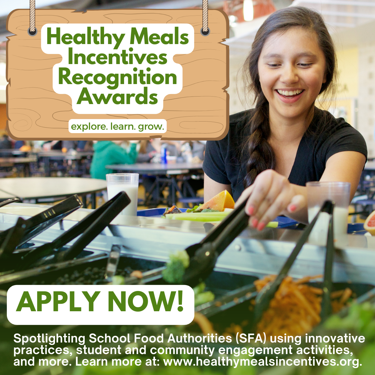 Girl getting food from cafeteria salad bar