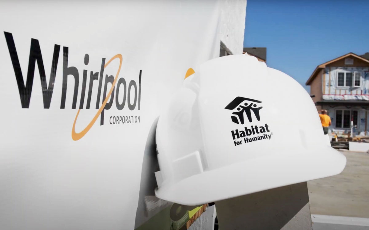 hardhat next to whirlpool sign