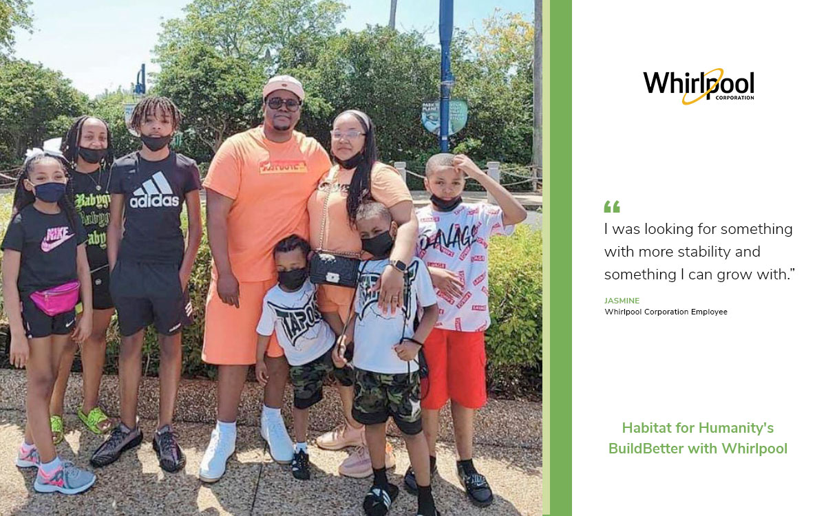 Jasmine and her family, wearing t-shirts, shorts, and face masks