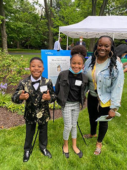 Two kids and one adult attending Healthy NewsWorks hosted their 2022 Film and Book Fest