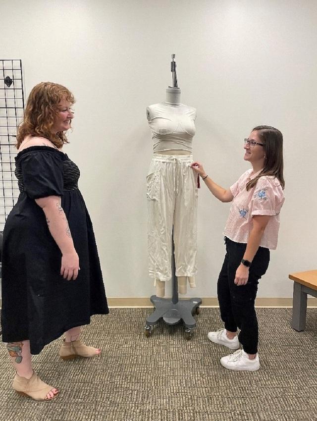 Meghan Moratz (right) working on a CALIA design with Technical Design Manager, Brittney Lauritzen (left)
