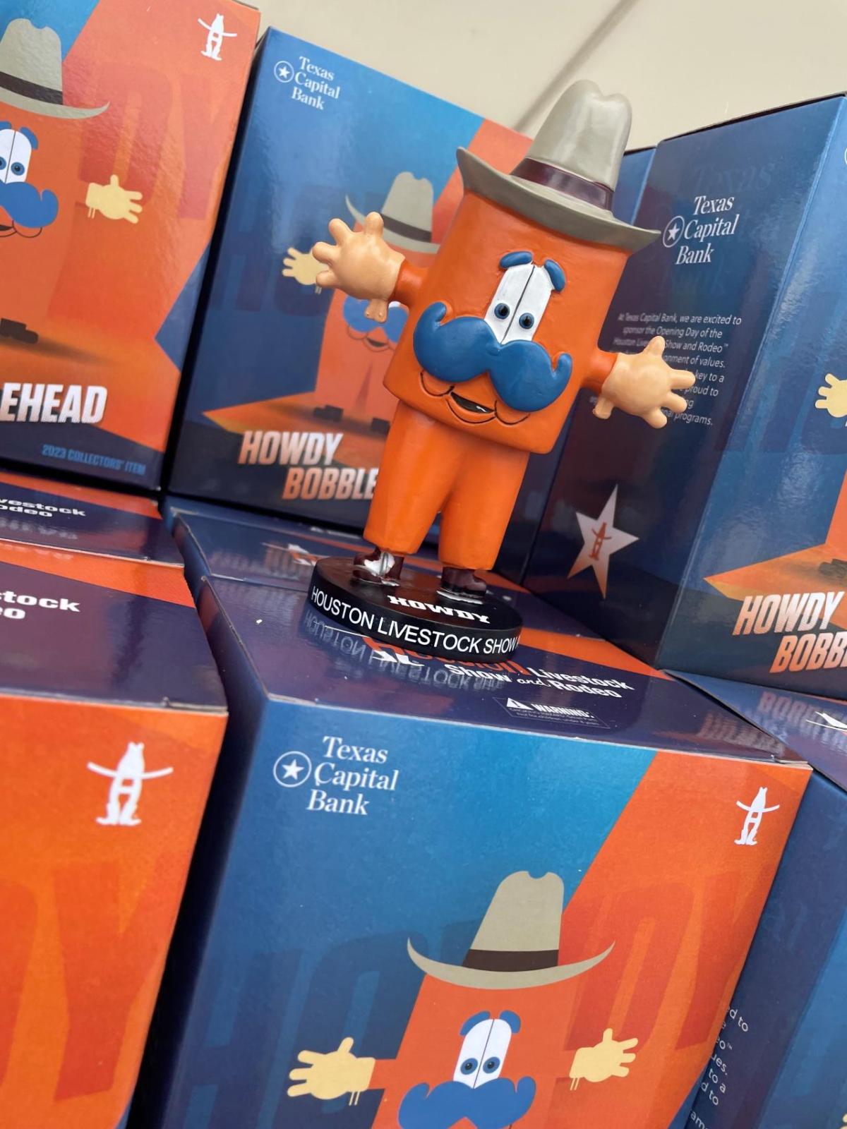 "Howdy Bobblehead" boxes, one out on display