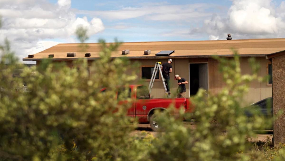 Goal Zero volunteers repairing a home. 