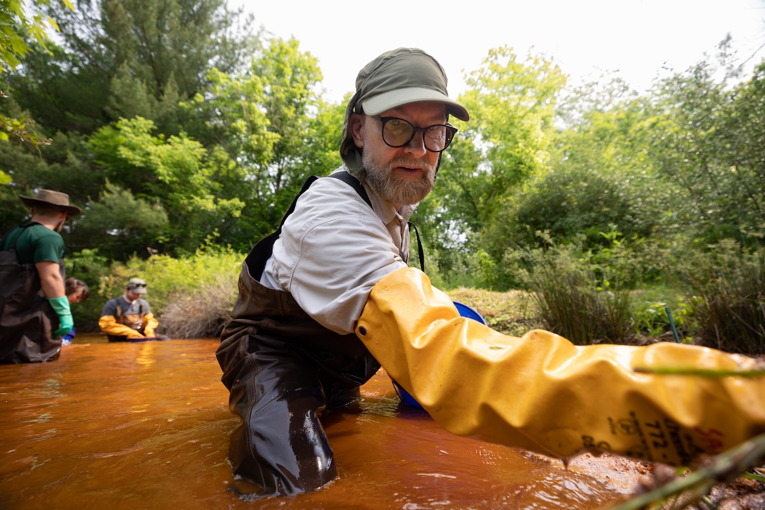 John Sabraw of Ohio University removes polluted water from Sunday Creek
