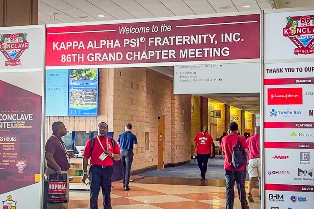 An archway sign "Welcome to the Kappa Alpha Psi Fraternity inc 86th grand chapter meeting.