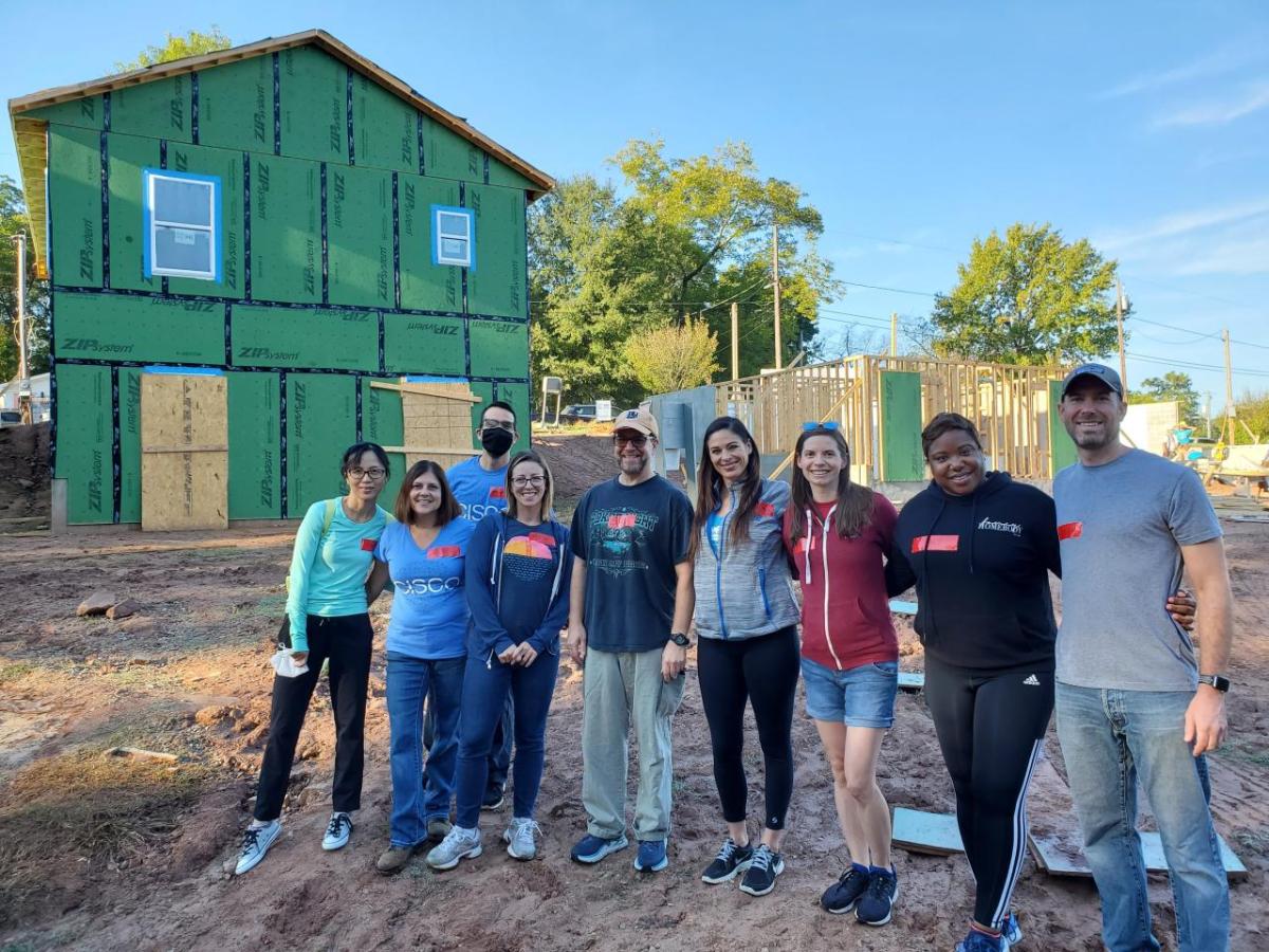 A team of volunteers at a home build site.