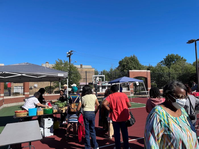 Residents shopping at the Farmers Market.