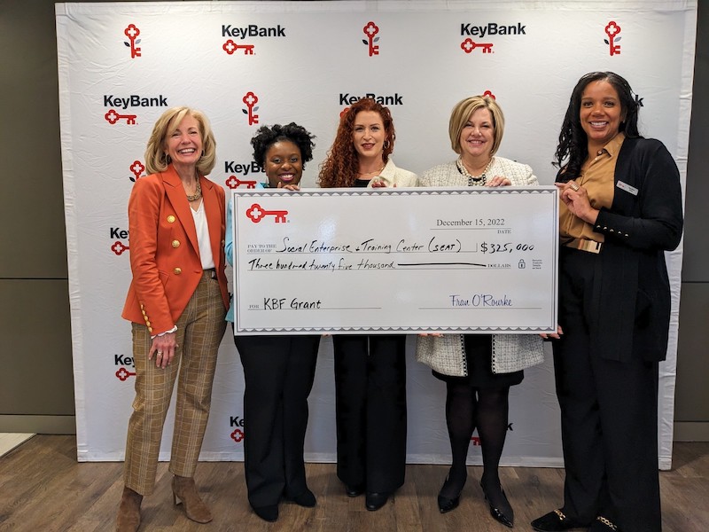 KeyBank and SEAT present check for $325,000.
