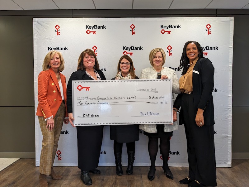 KeyBank presents check to IPH team for $200,000.