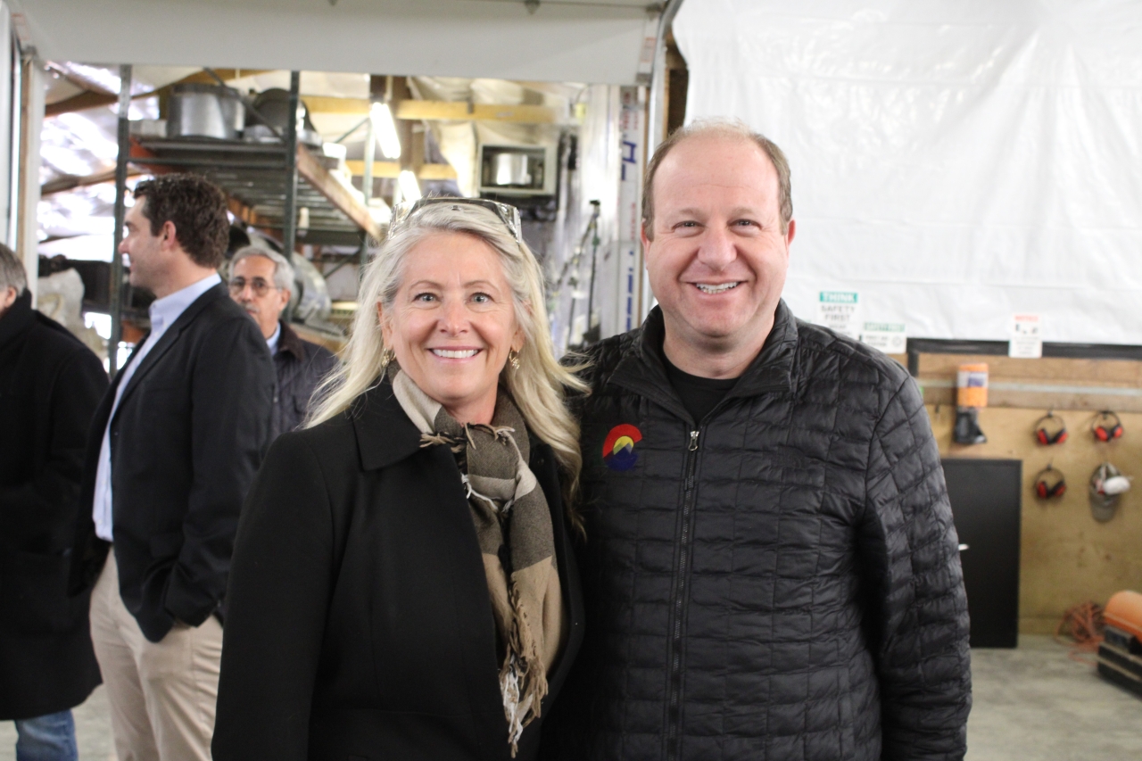 Governor Polis and element6 Dynamics CEO Kim Kovacs at the element6 Dynamics processing facility in Longmont, Colo.
