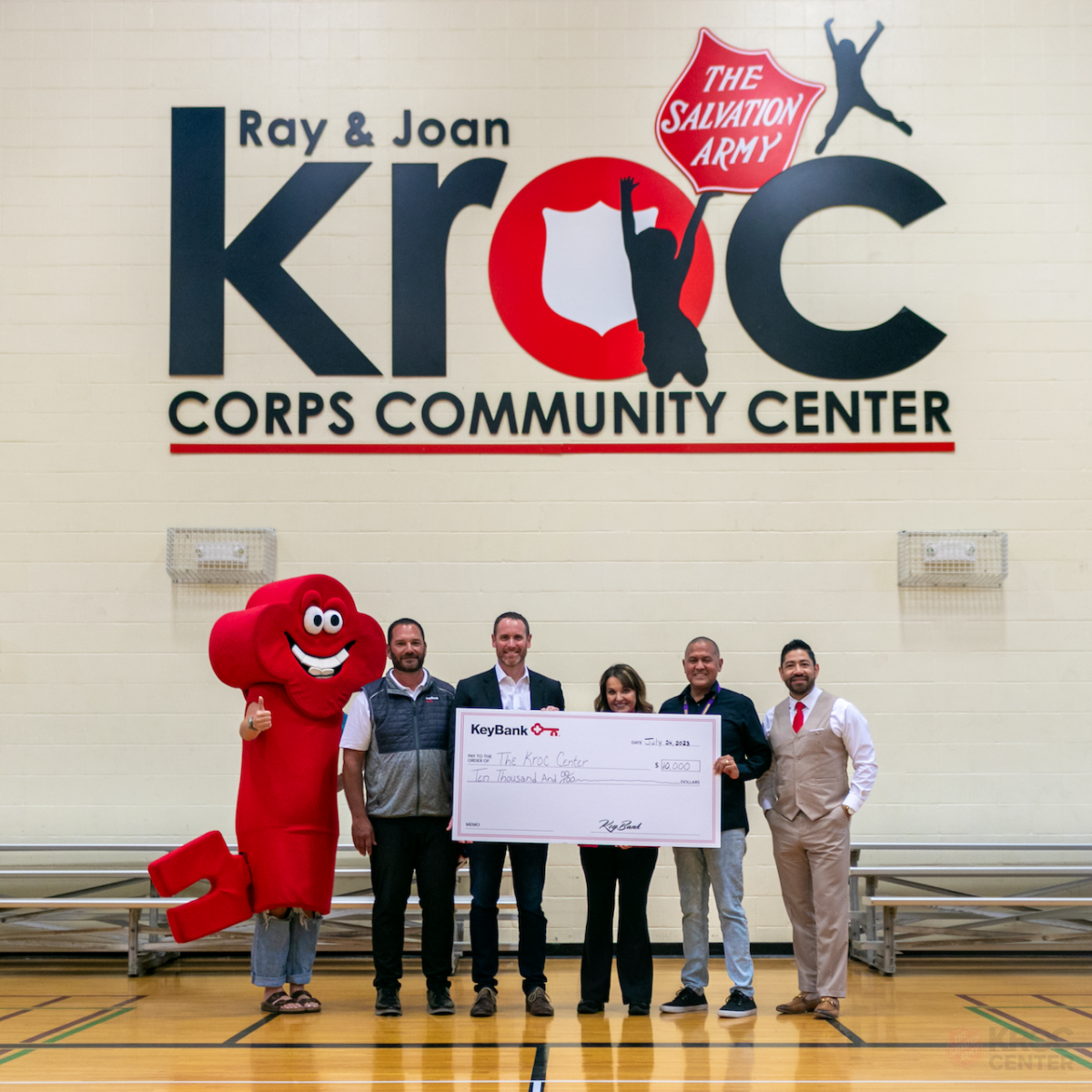 Kroc Corps Community Center team receiving a check from the KeyBank team.