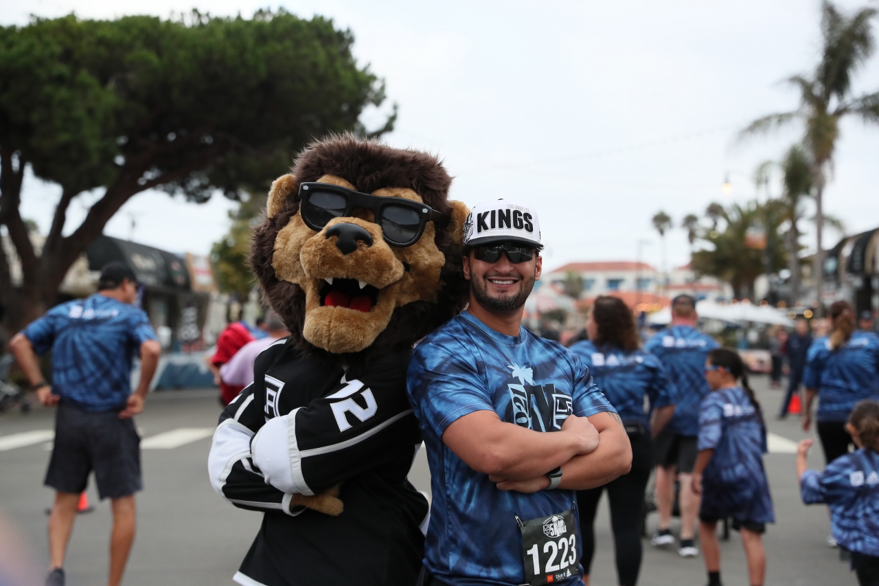 LA Kings mascot Bailey cheers on and poses with community members participating in the annual LA Kings 5K benefitting the LA Kings Care Foundation and Hydrocephalus Association on September 18, 2021 in Redondo Beach, Calif.