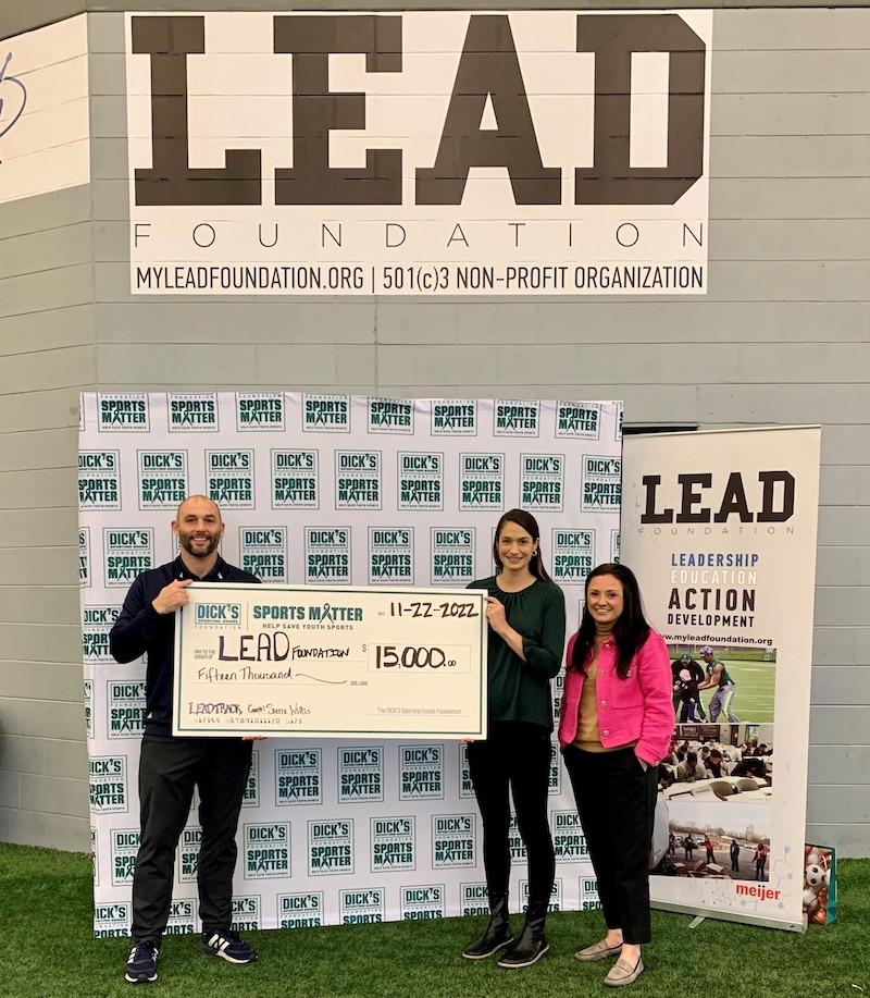 Lead Foundation being presented with a check.