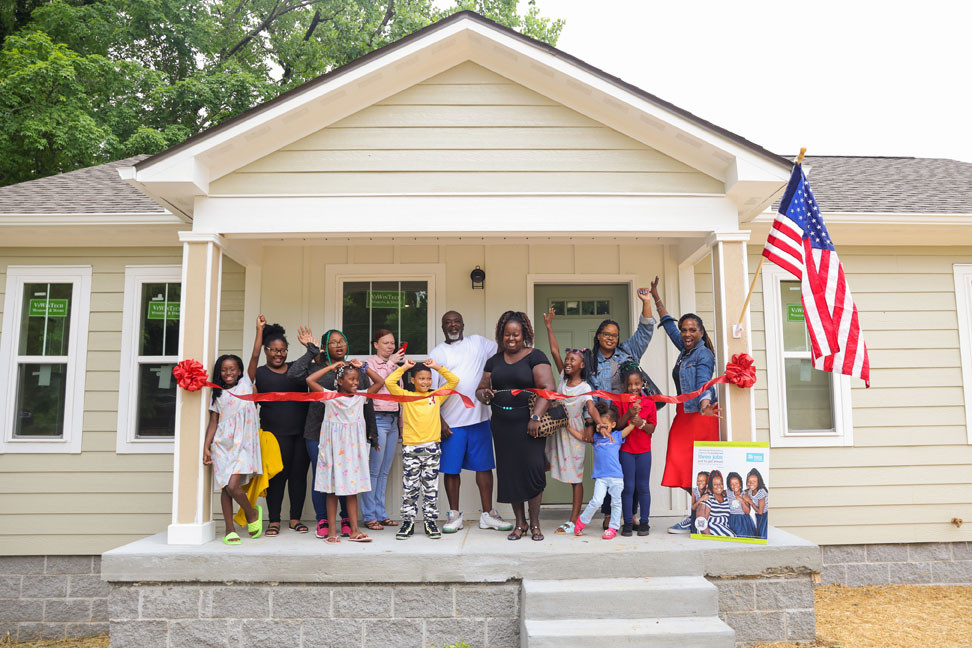 ribbon cutting at new house