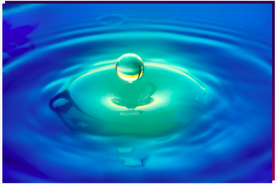 water droplet with ripples in water