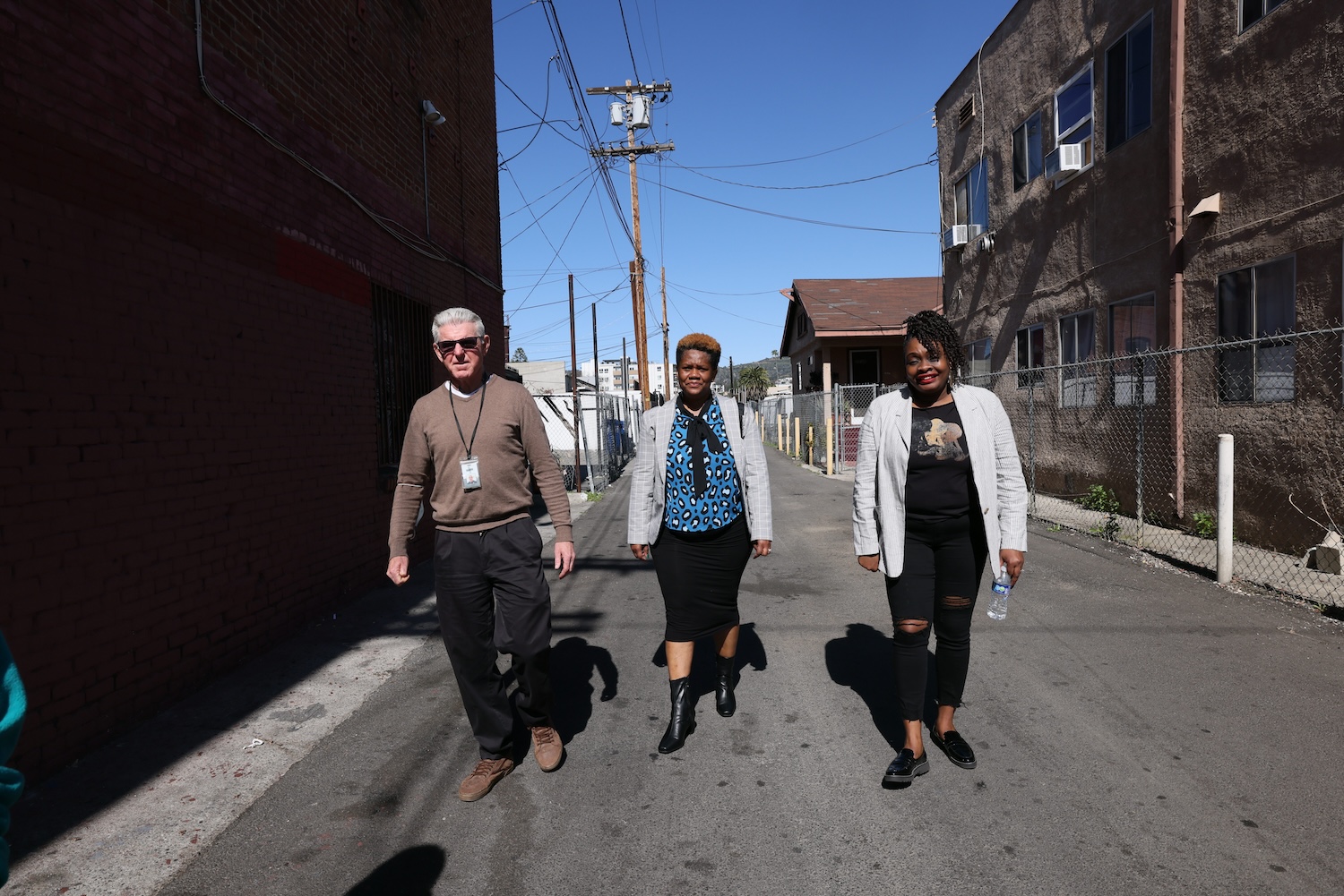 Leaders with the LEAD program — which develops community alternatives to police and alternatives to policing — walk the streets of Seattle