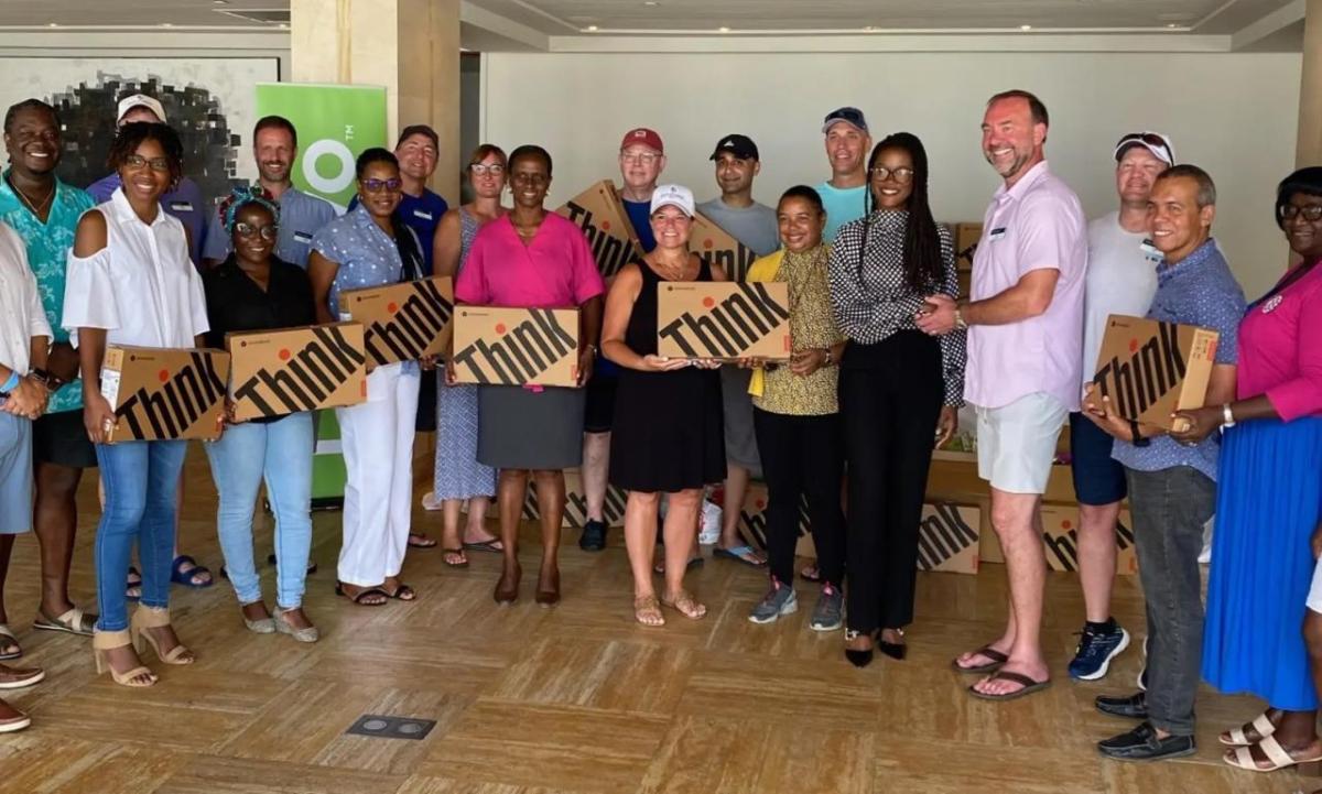 group holding lenovo thinkpad boxes