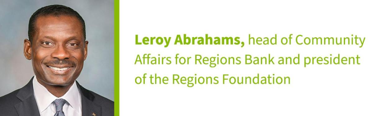 Leroy Abrahams on the left, and name with title on the right.