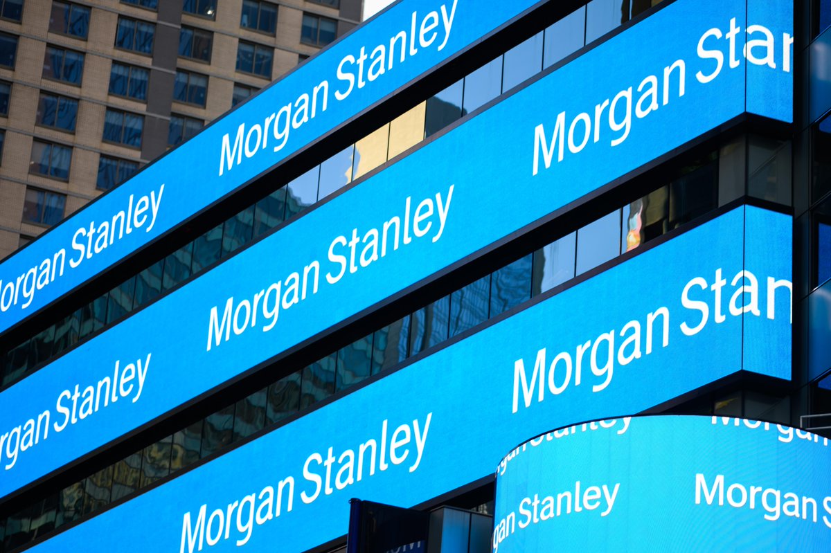 Outside of a glass building with Morgan Stanley written on the windows. 