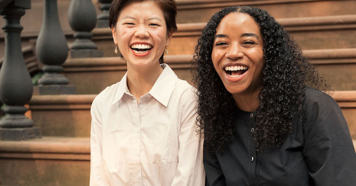 Two people laughing