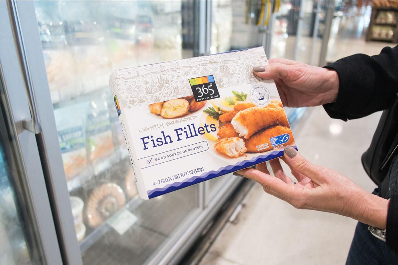 Marine Stewardship Council label on a package of fish fillets — green labels on products