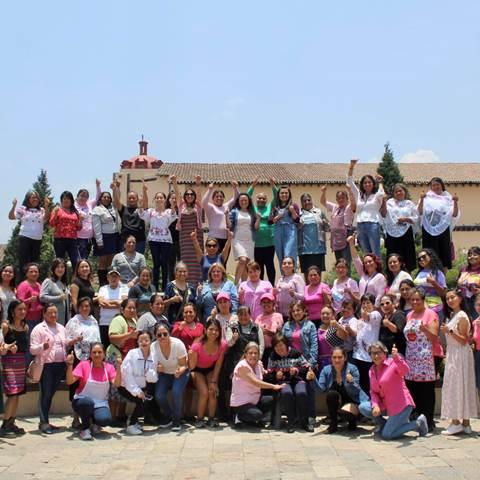 A group of people posed outside.