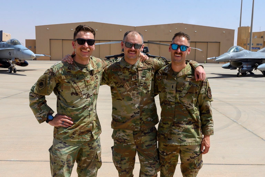 CJ (right) and his two older brothers while deployed in Saudi Arabia 