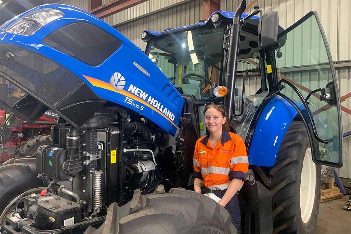 woman standing in front of equipment 