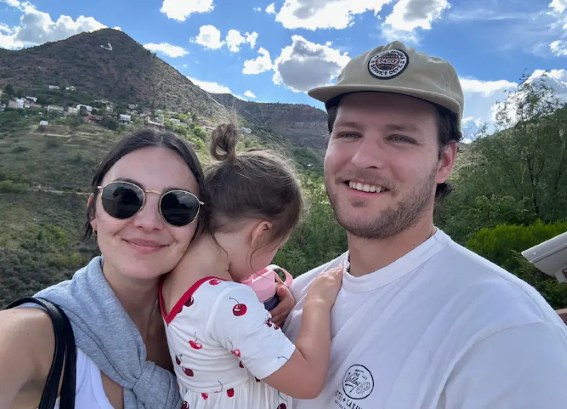 Natalie shown with her husband and daughter.