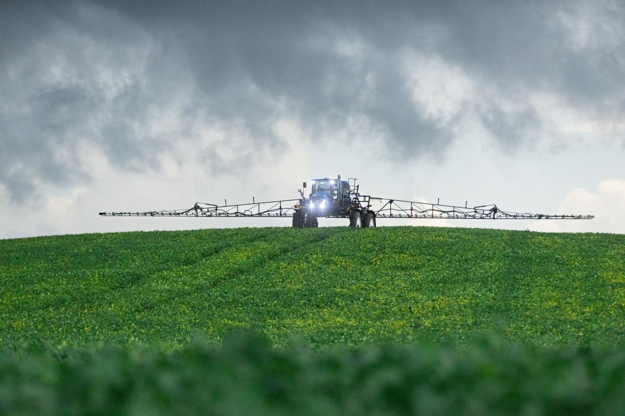 Harvester in field