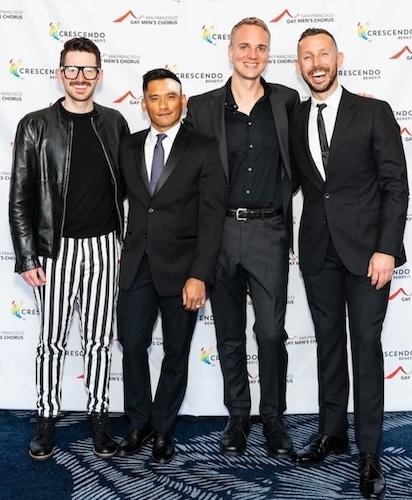 Nick Koenig shown with three friends at a red carpet event.