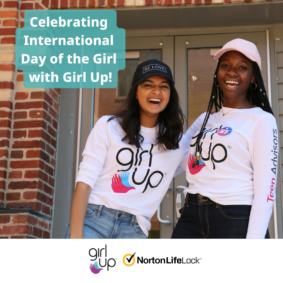 Two people on a front porch, both wearing "girl up" t-shirts.