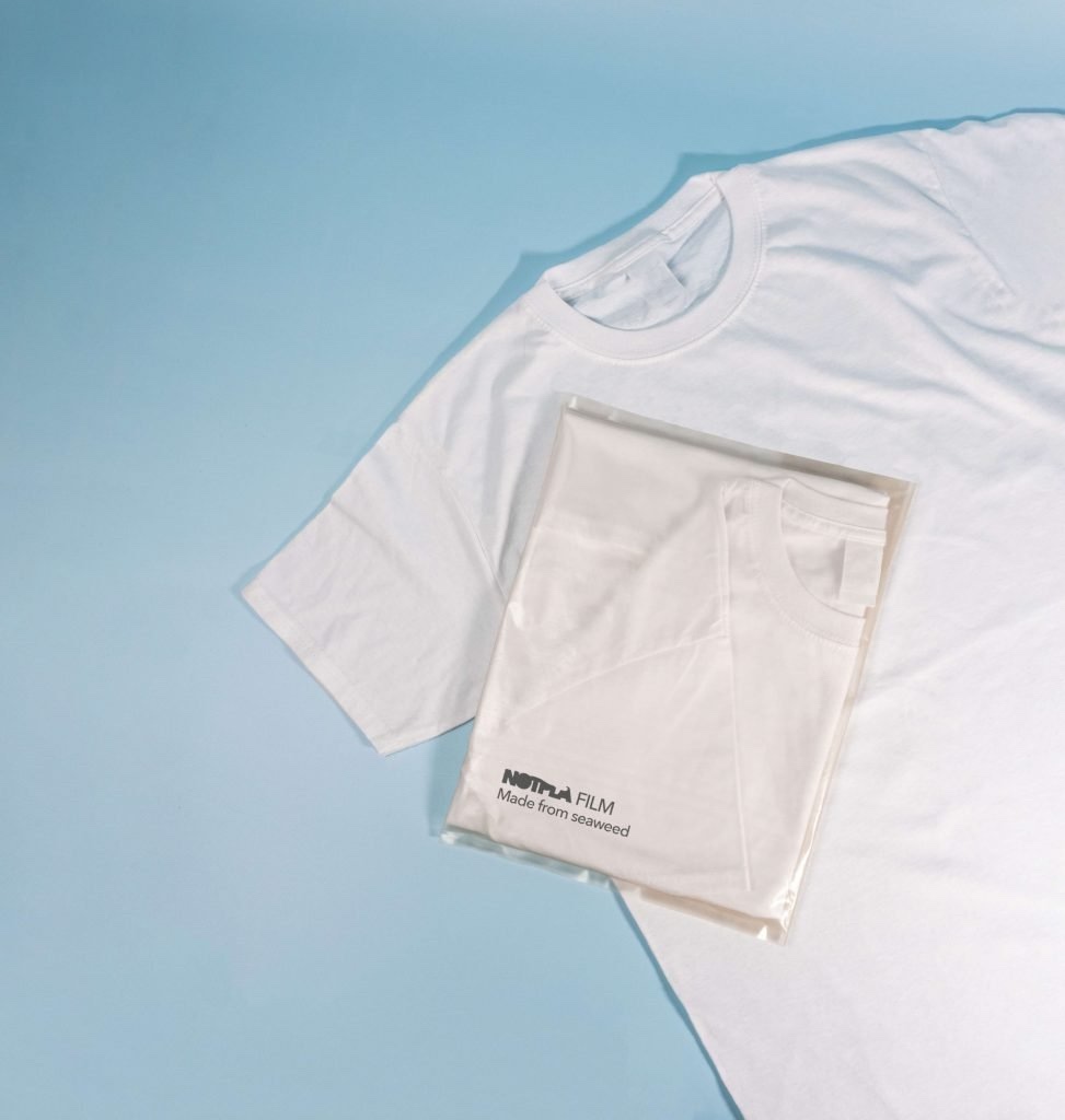 The Notpla alternative to thin-film plastic poly bags used to package clothing. 