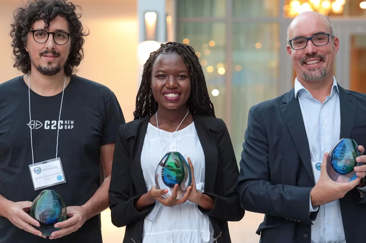 2022 Ocean Exchange Winners with Solutions for CO2 and Fisheries Protection: Ocean/Climate Nexus. L-to-R, André Mão de Ferro of C2C-NewCap, Diana Orembe of NovFeed and Jon Asin of BeePlanet Factory