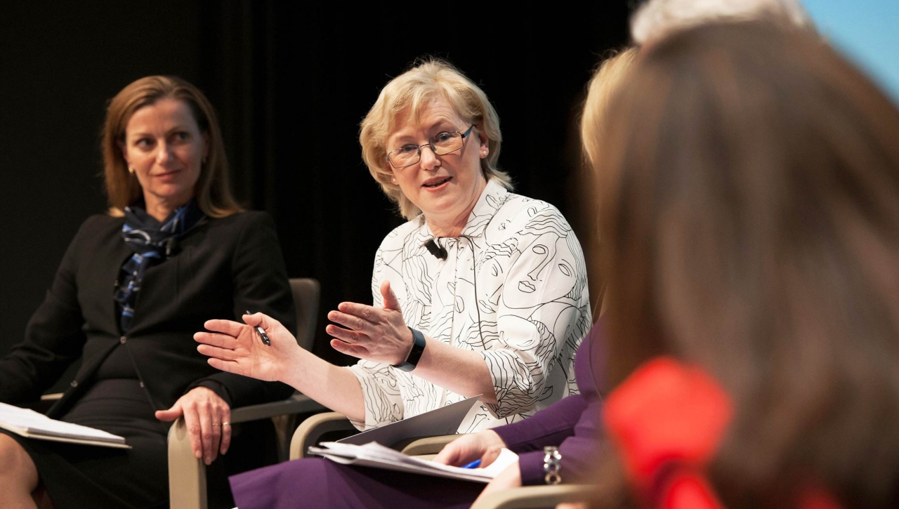 image of a panel of women speaking together