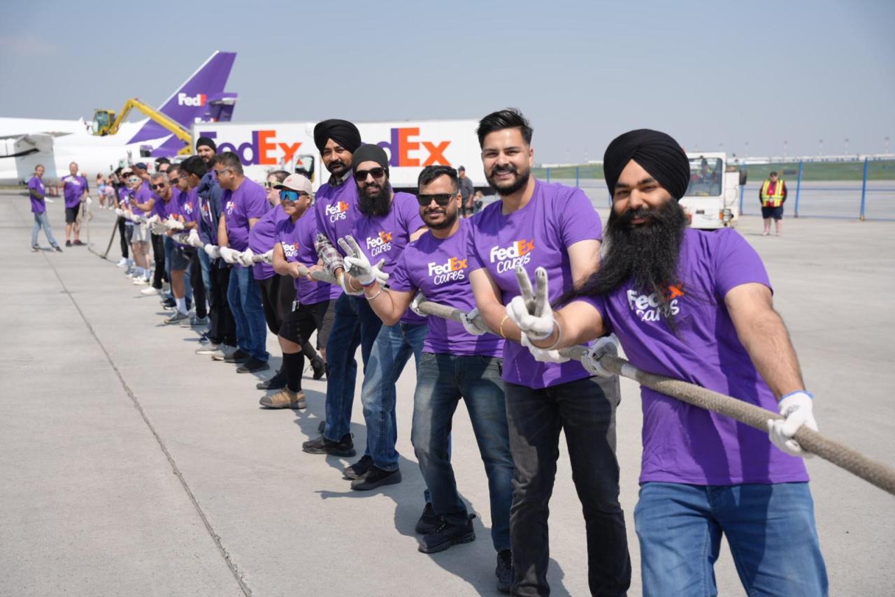 Volunteers play tug-of-war