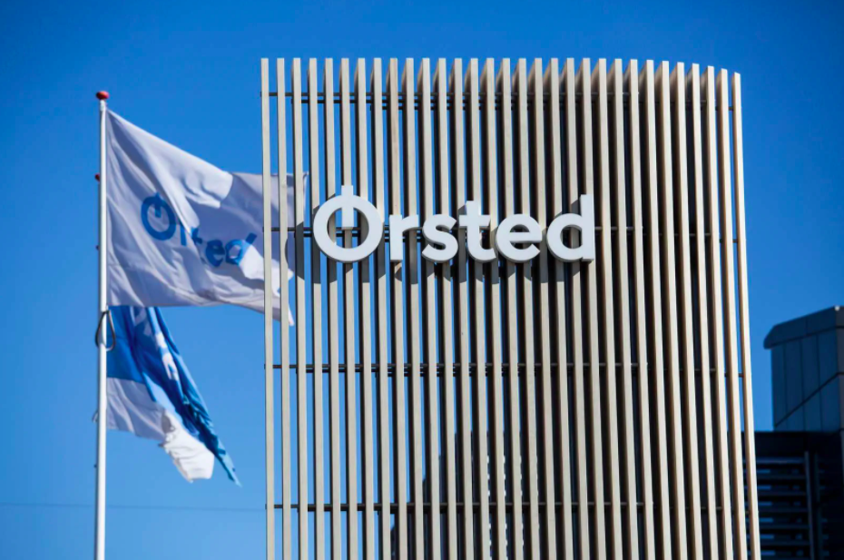 Image of Ørsted headquarters with two flags on the left side of the image