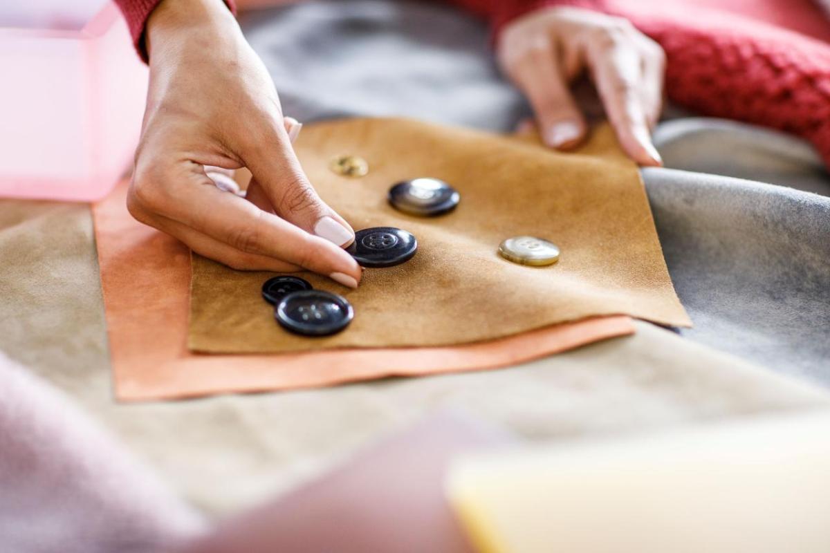 Coach designer matching buttons to fabric