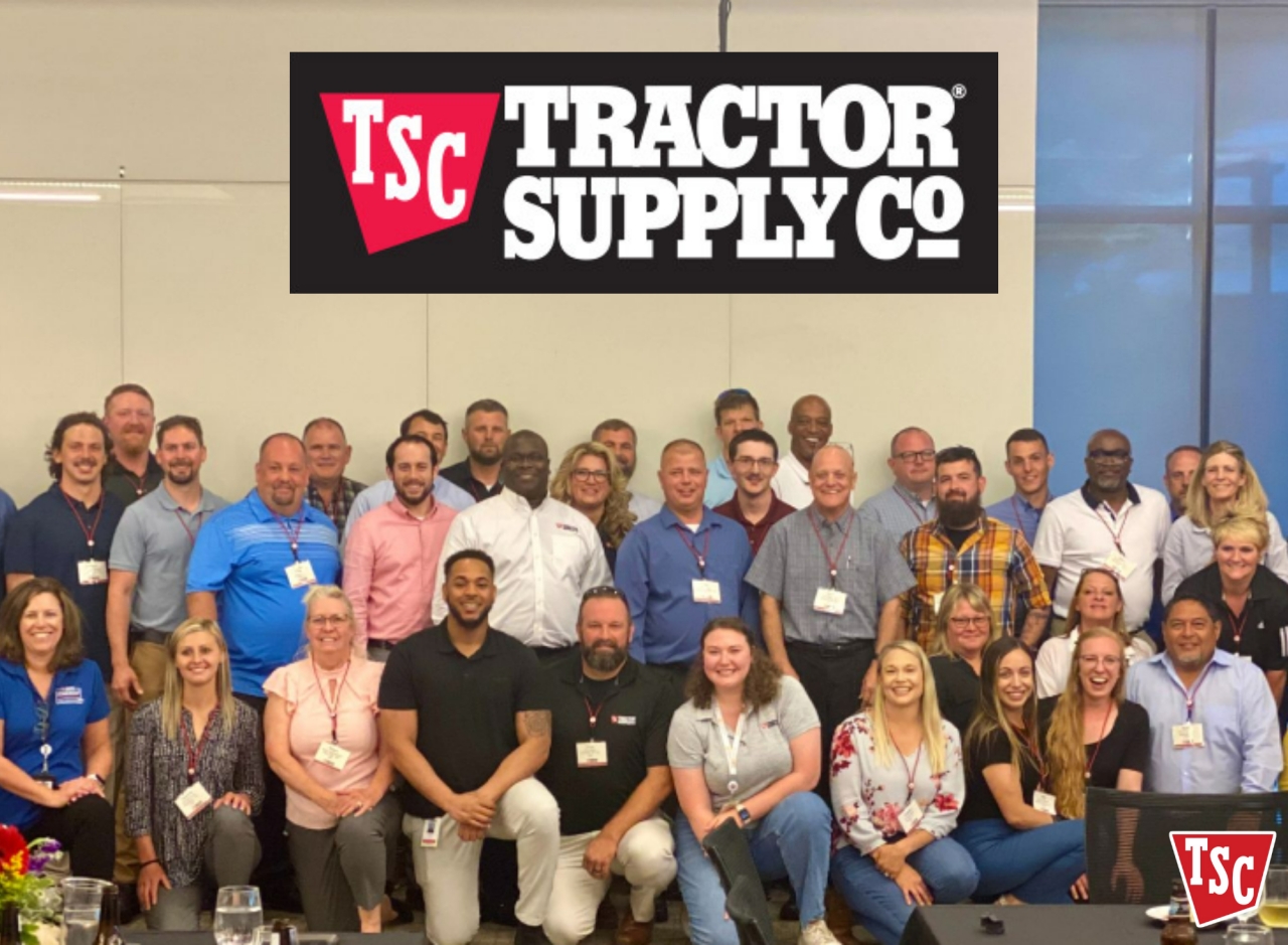 Tractor Supply employees pose for a picture