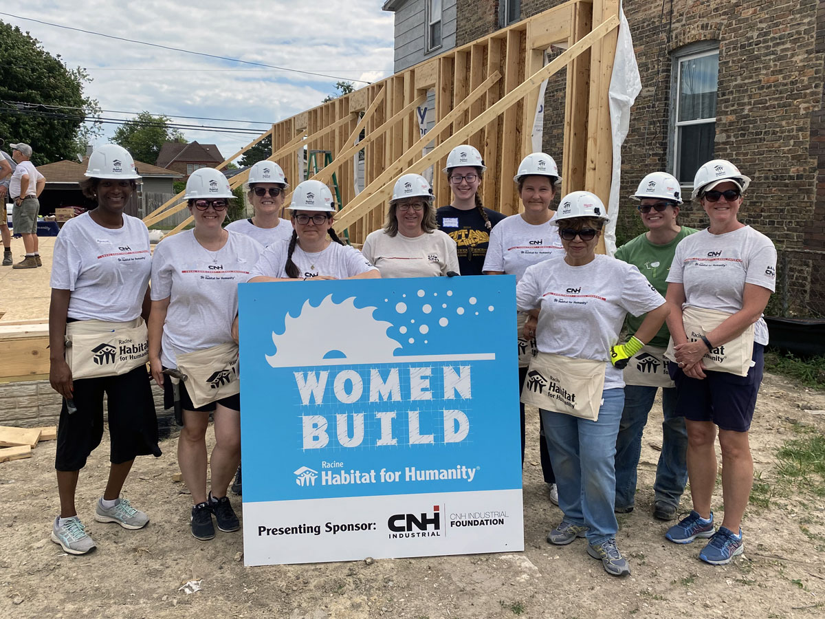 Habitat for Humanity’s Women Build women with sign