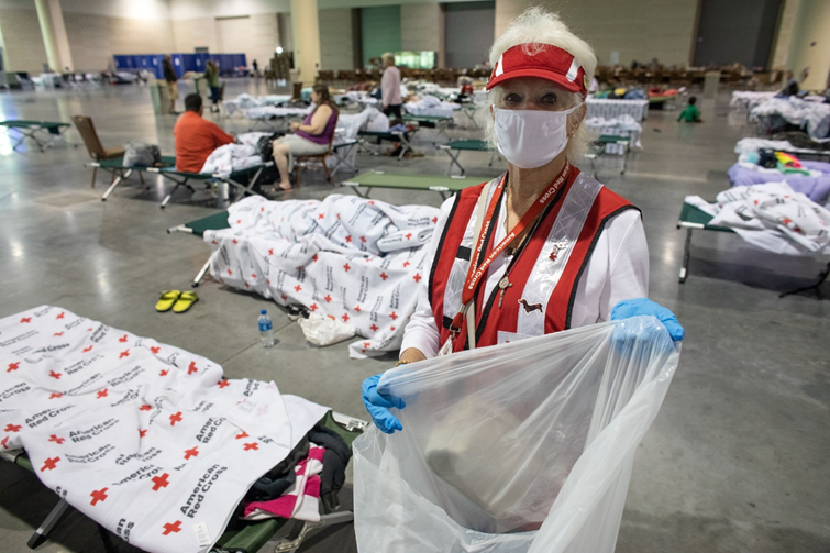 Red Cross volunteers are caring for the hundreds of evacuees seeking shelter at the Ocean Convention Center in Daytona Beach in the wake of Hurricane Ian. (Photo by Marko Kokic/American Red Cross)